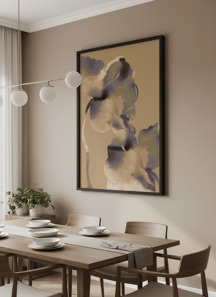 Wall art styled above a dining table in a contemporary home