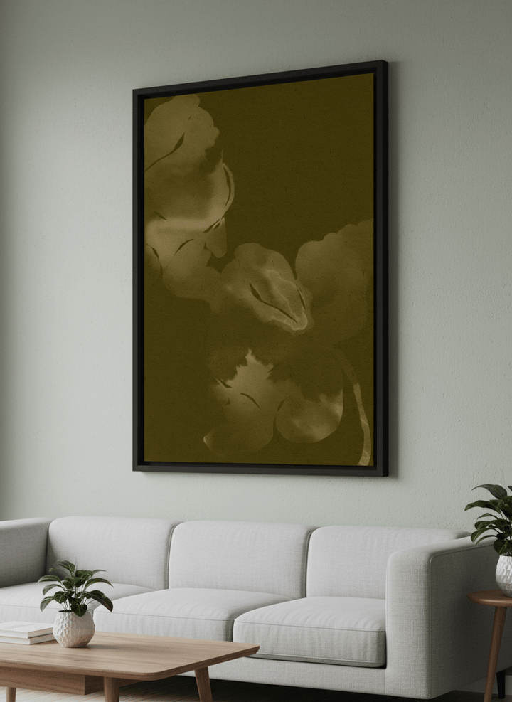 Modern wall art styled above a sofa in a neutral living room