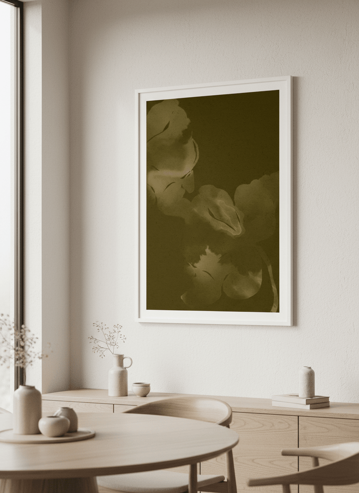 Wall art styled above a dining table in a contemporary home