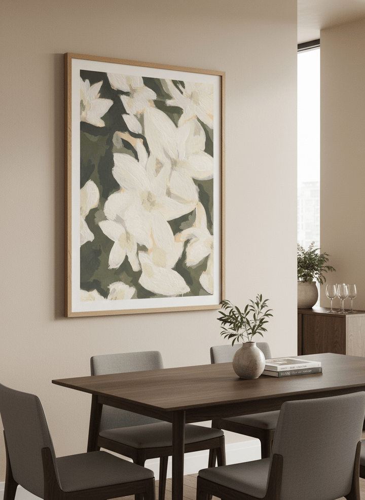 Wall art styled above a dining table in a contemporary home