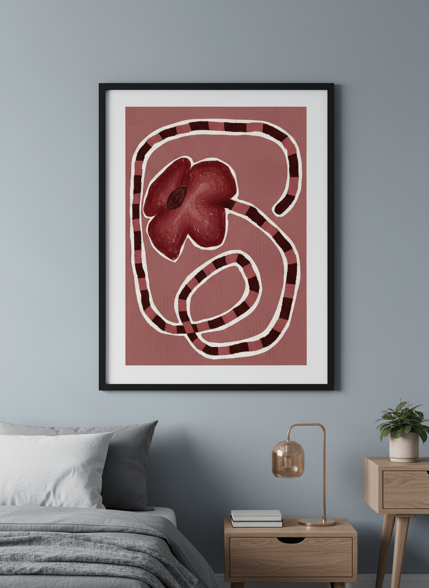 Minimalist artwork displayed in a calm, light-filled bedroom interior