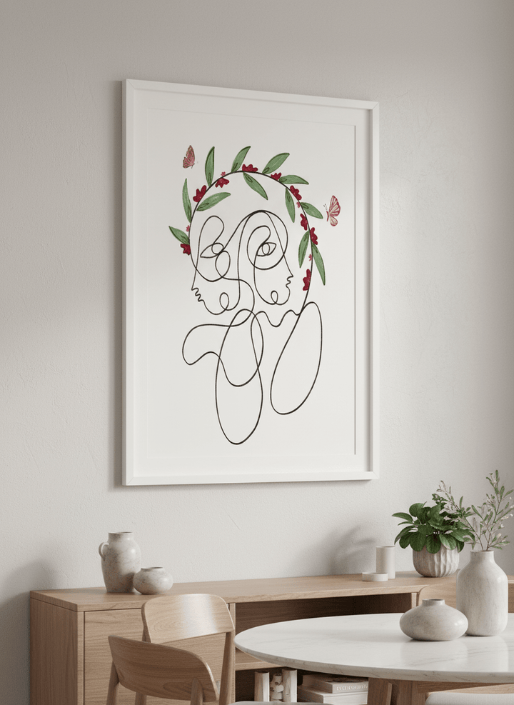 Wall art styled above a dining table in a contemporary home