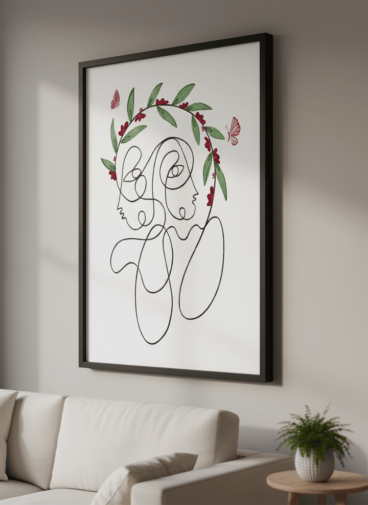 Modern wall art styled above a sofa in a neutral living room