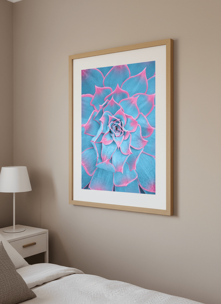 Minimalist artwork displayed in a calm, light-filled bedroom interior
