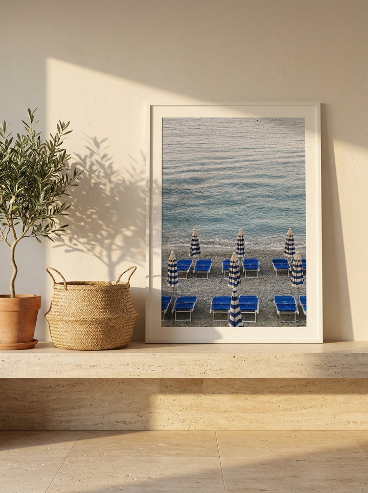 Modern wall art print standing on a console in a Mediterranean bedroom