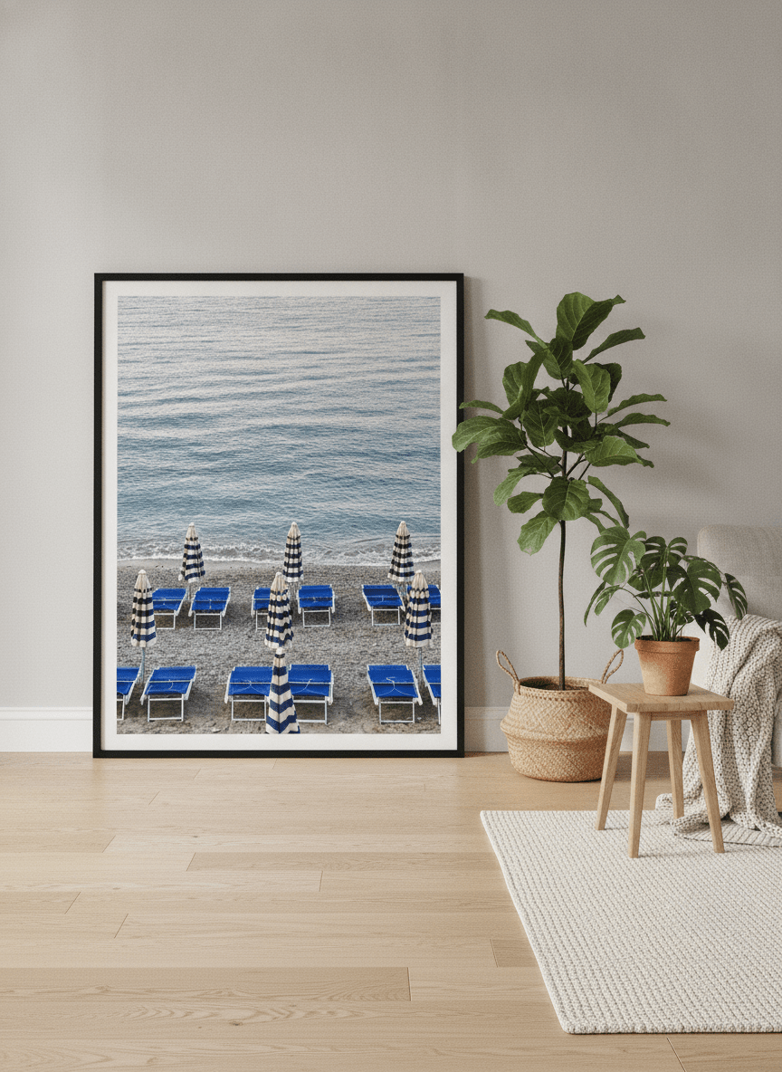 Oversized statement modern wall art print leaning against the wall in a bright Scandinavian living room