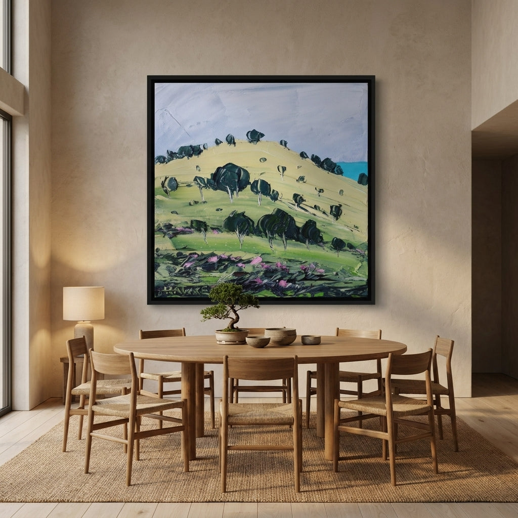 Oversized statement canvas wall art with a black surround styled on the wall in a warm Japandi dining room