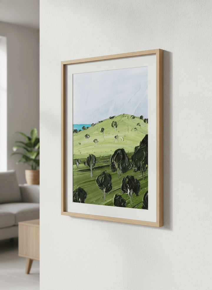 Modern wall art styled above a sofa in a neutral living room