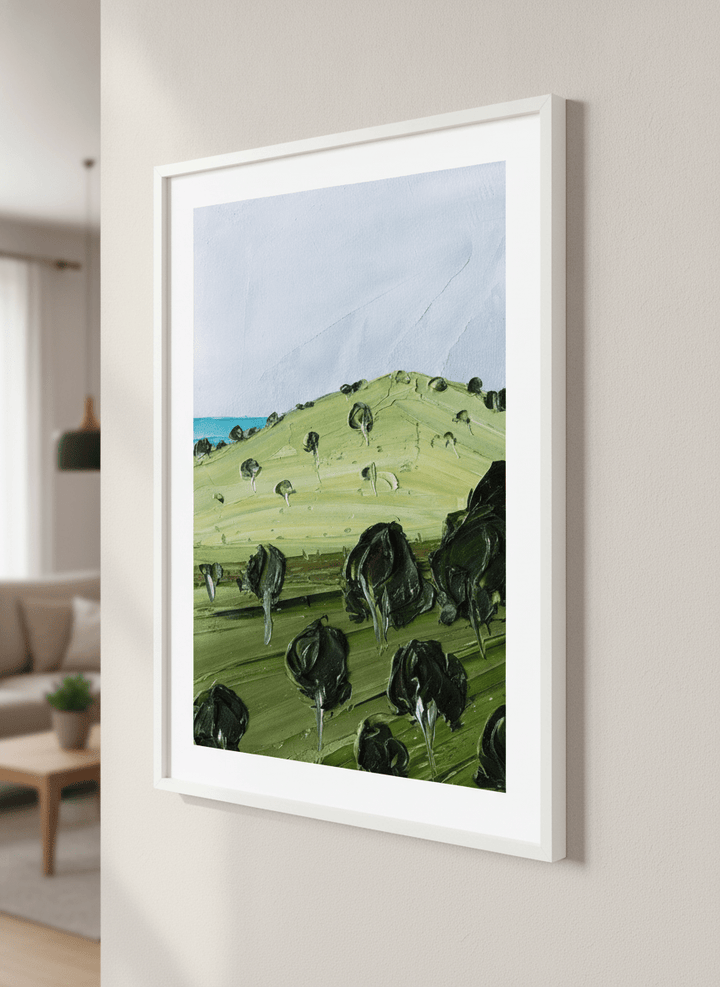 Modern wall art styled above a sofa in a neutral living room