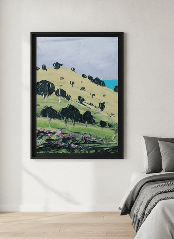 Minimalist artwork displayed in a calm, light-filled bedroom interior