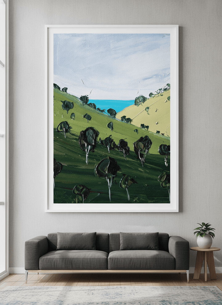 Modern wall art styled above a sofa in a neutral living room