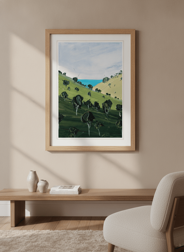 Modern wall art styled above a sofa in a neutral living room