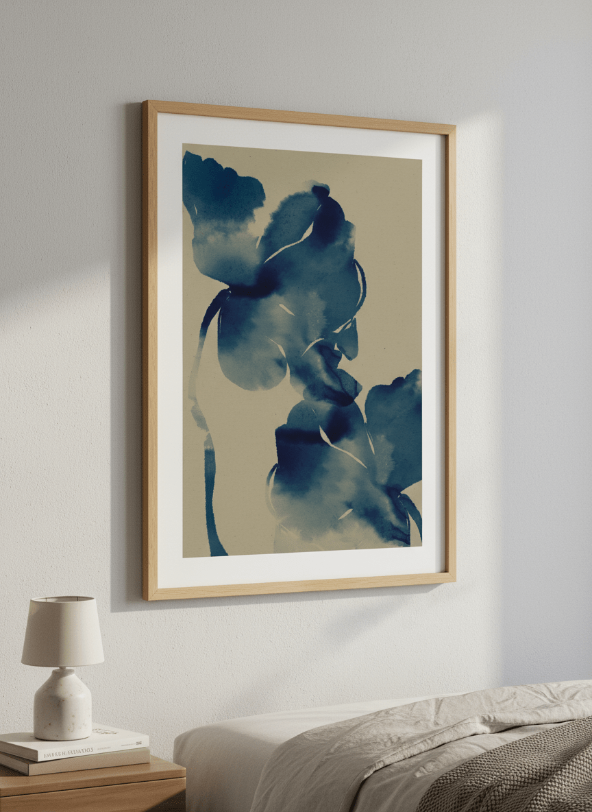 Minimalist artwork displayed in a calm, light-filled bedroom interior