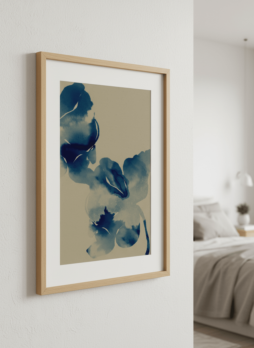 Minimalist artwork displayed in a calm, light-filled bedroom interior