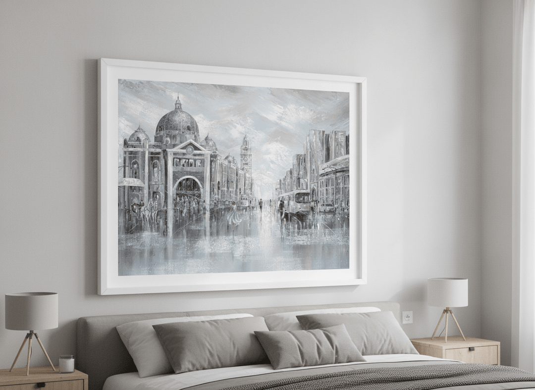 Minimalist artwork displayed in a calm, light-filled bedroom interior