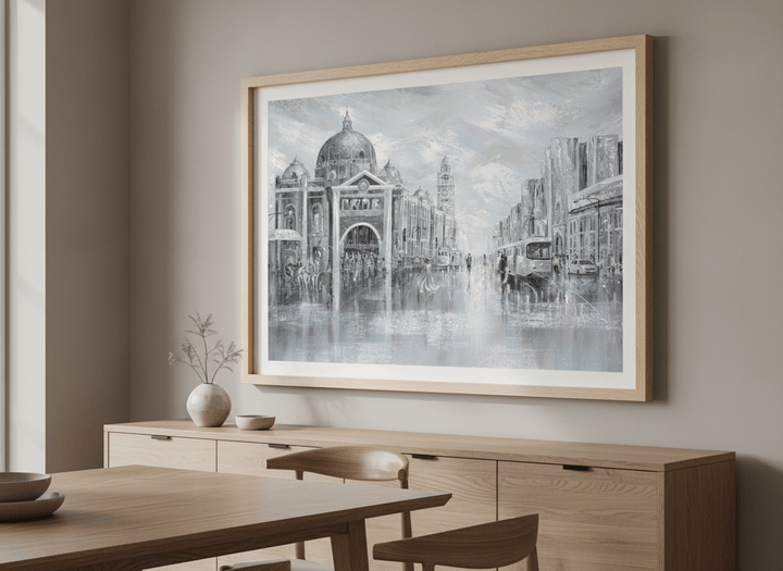 Wall art styled above a dining table in a contemporary home