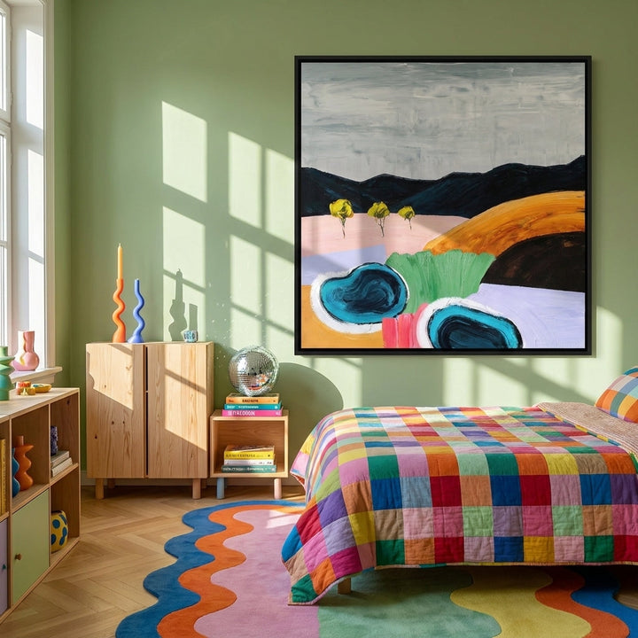 Oversized statement canvas wall art with a black surround styled on the wall in a colourful eclectic bedroom