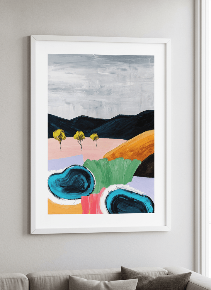 Modern wall art styled above a sofa in a neutral living room