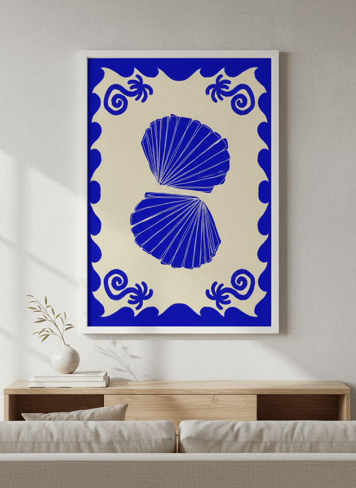 Modern wall art styled above a sofa in a neutral living room