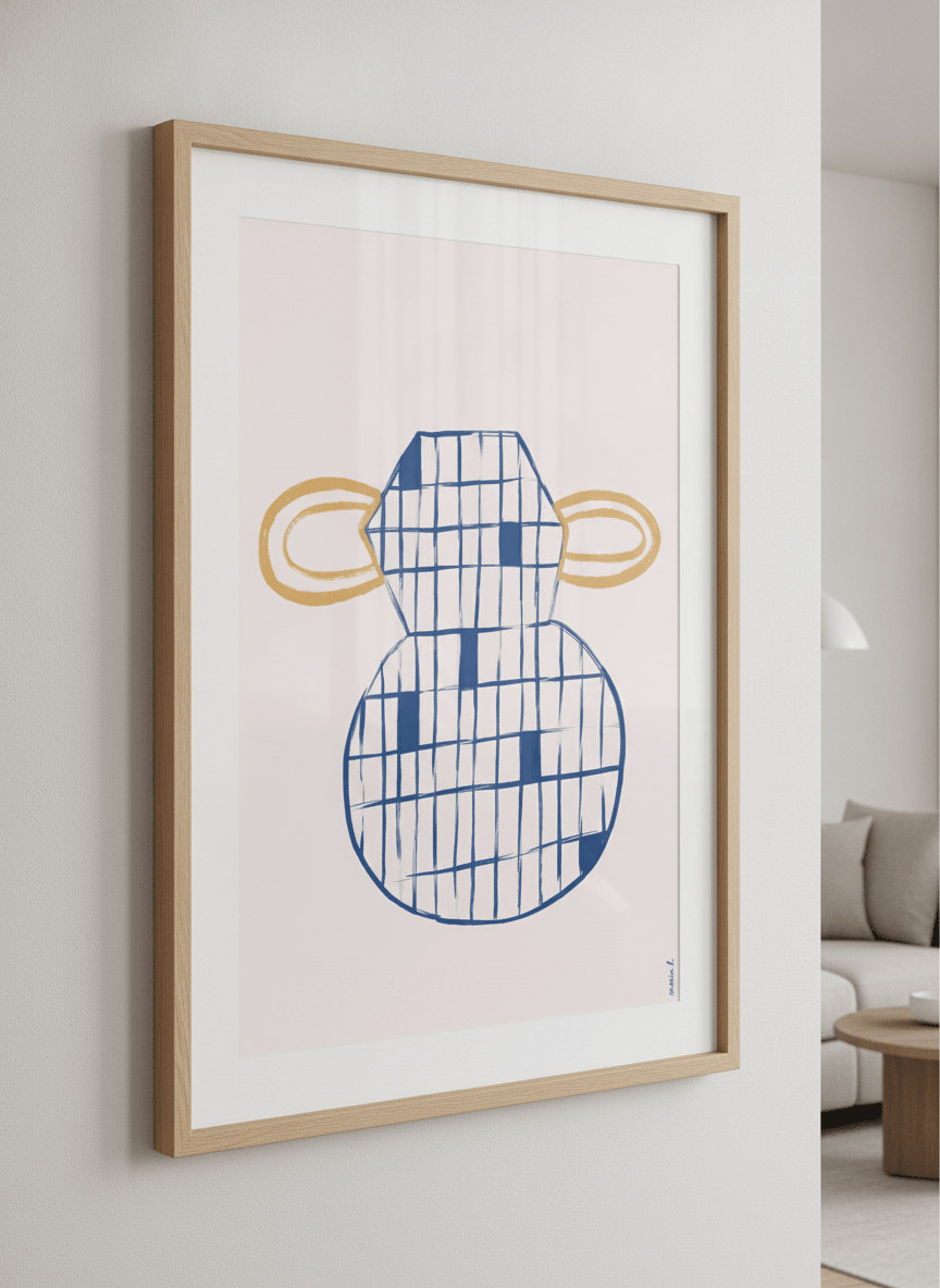 Modern wall art styled above a sofa in a neutral living room