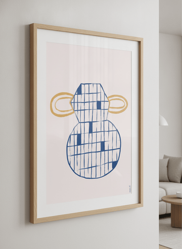 Modern wall art styled above a sofa in a neutral living room