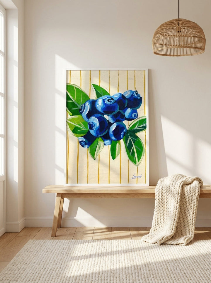Modern wall art print standing on a bench in a bright Scandinavian living room