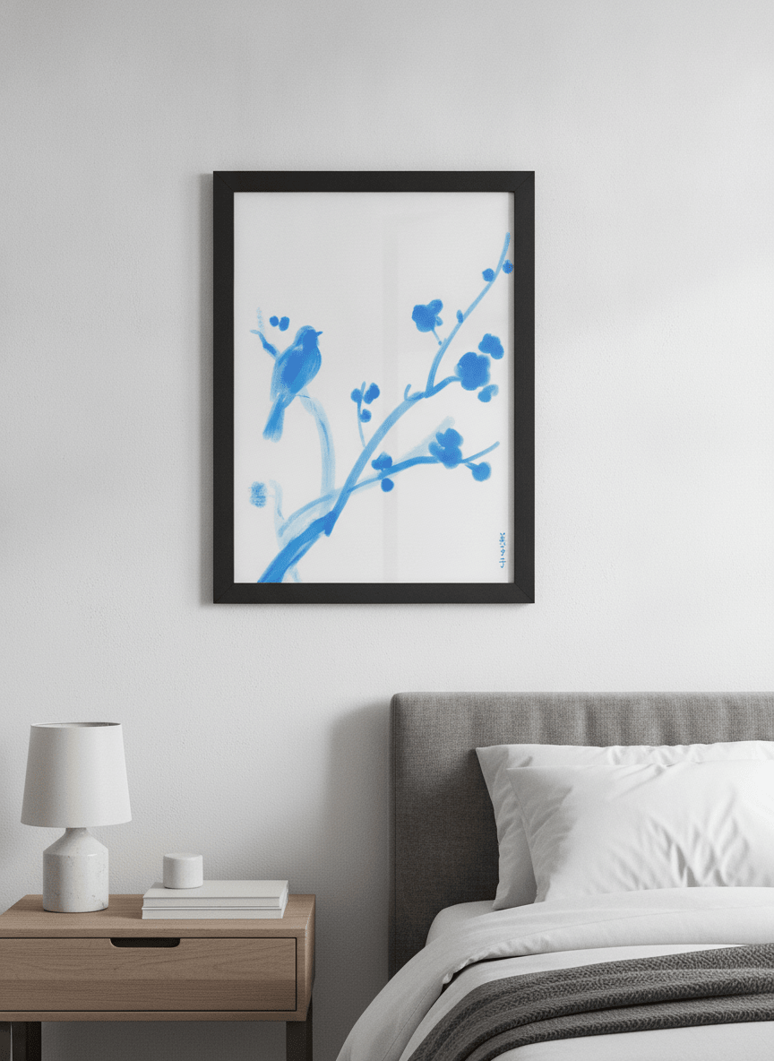 Minimalist artwork displayed in a calm, light-filled bedroom interior
