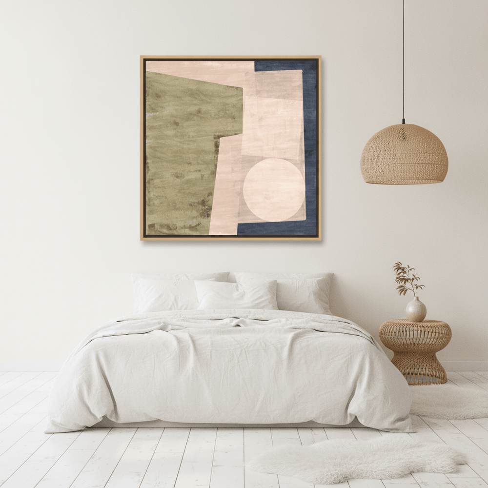 Oversized statement canvas wall art with a natural timber surround styled on the wall in a bright Scandinavian bedroom
