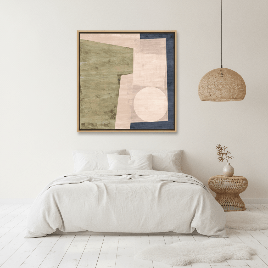 Oversized statement canvas wall art with a natural timber surround styled on the wall in a bright Scandinavian bedroom