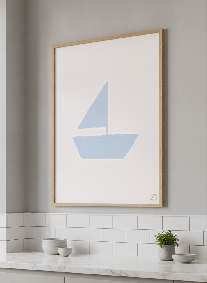 Artwork styled on the wall of a bright modern kitchen
