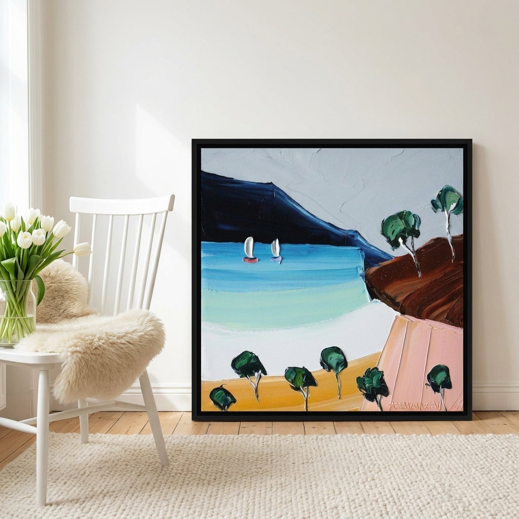 Canvas wall art with a black surround leaning against the wall in a bright Scandinavian dining room