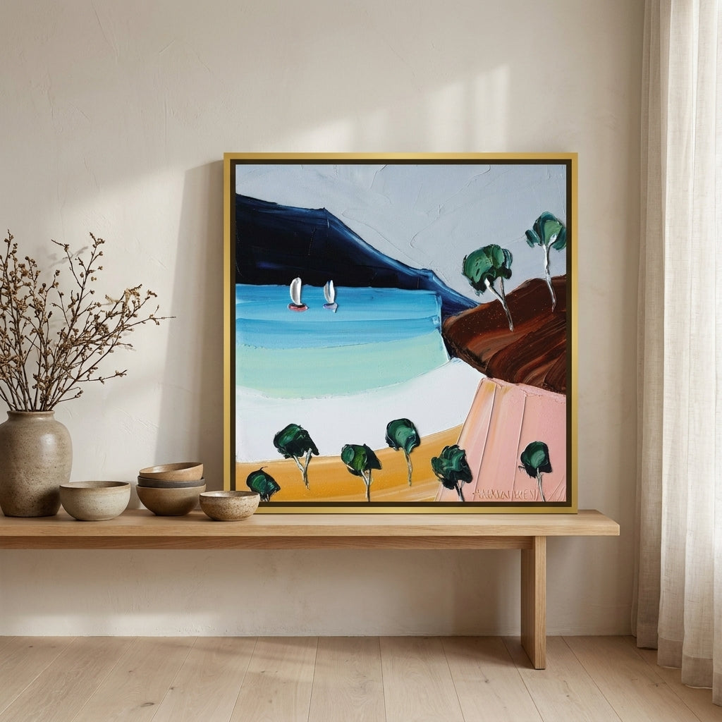 Canvas wall art with a gold leaf surround standing on a bench in a warm Japandi home office