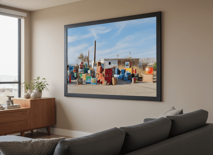 Modern wall art styled above a sofa in a neutral living room