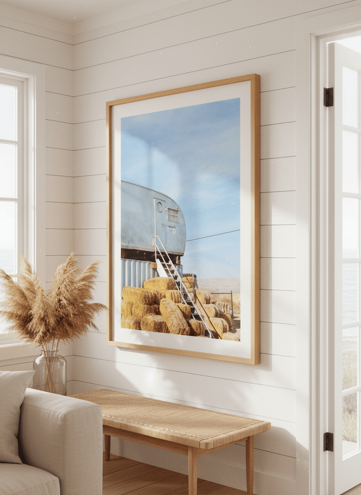Neutral wall art displayed in a sunny coastal beach house