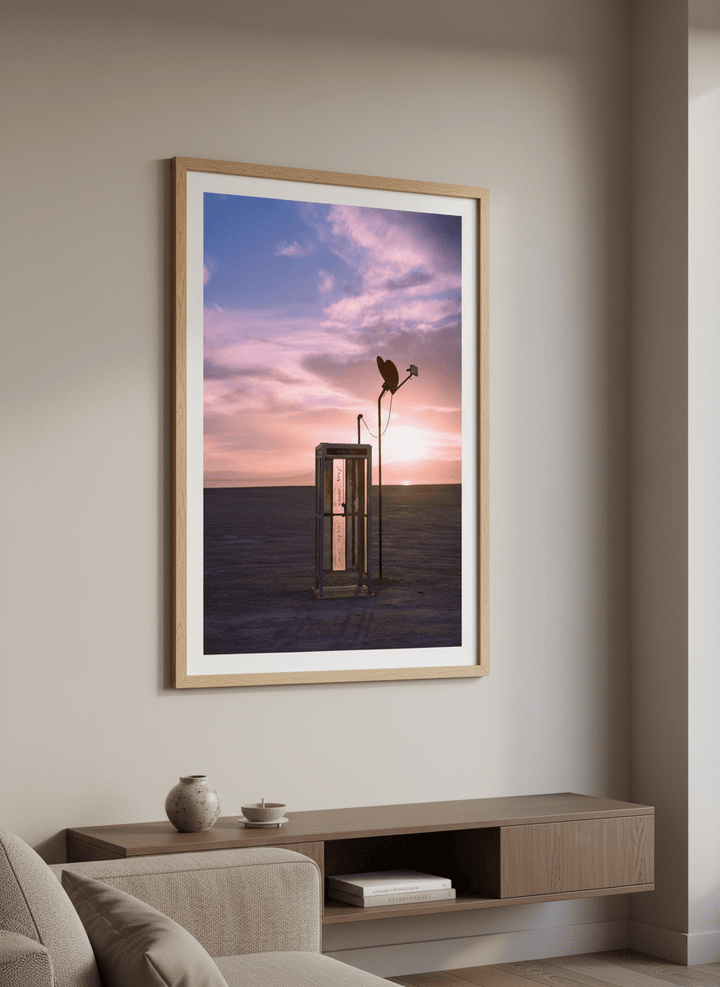 Modern wall art styled above a sofa in a neutral living room
