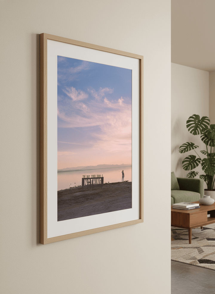 Modern wall art styled above a sofa in a neutral living room