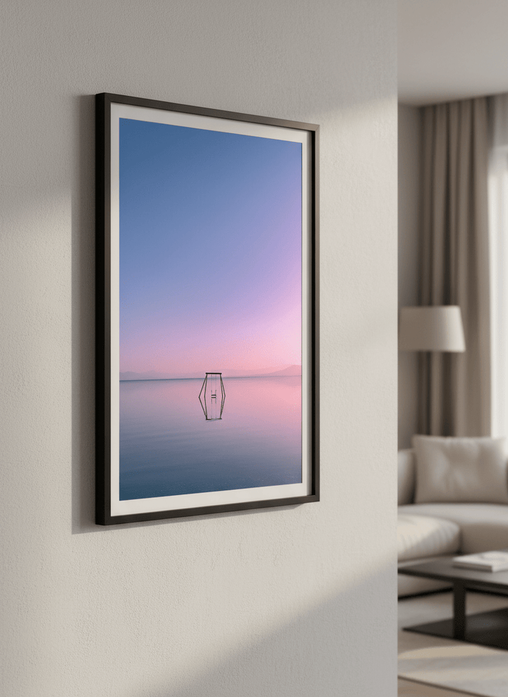 Modern wall art styled above a sofa in a neutral living room