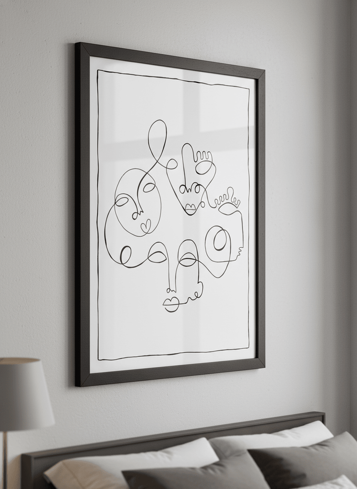 Minimalist artwork displayed in a calm, light-filled bedroom interior