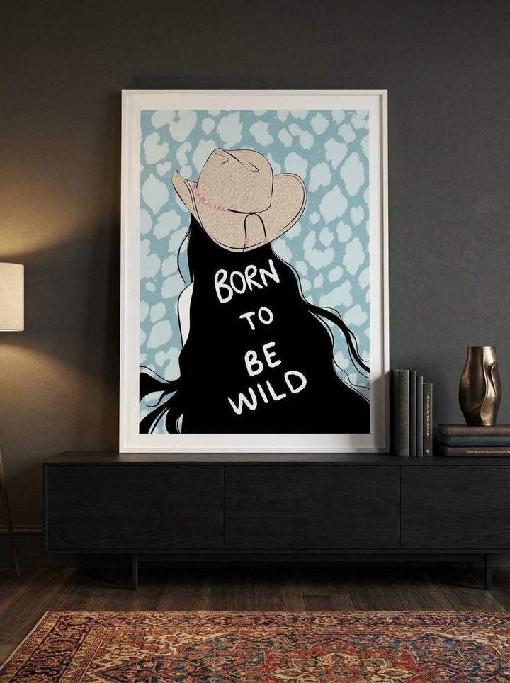 Modern wall art print standing on a console in a moody living room