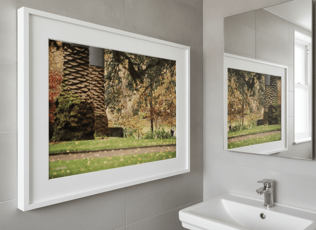 Modern print displayed in a clean minimalist bathroom setting