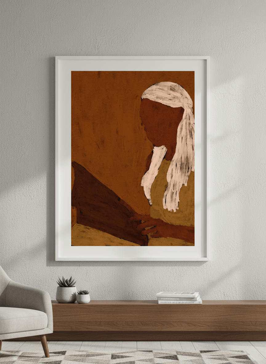 Modern wall art styled above a sofa in a neutral living room