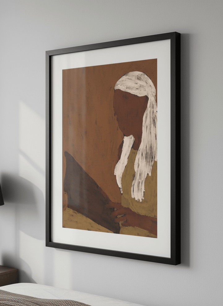 Minimalist artwork displayed in a calm, light-filled bedroom interior