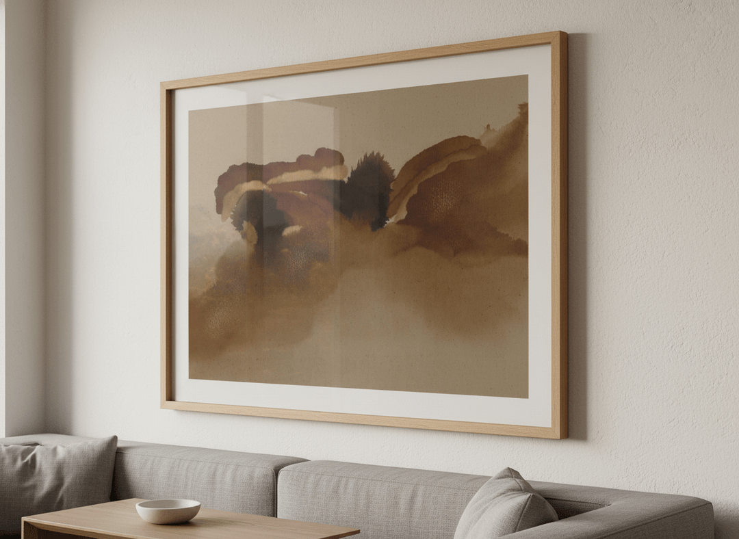 Modern wall art styled above a sofa in a neutral living room