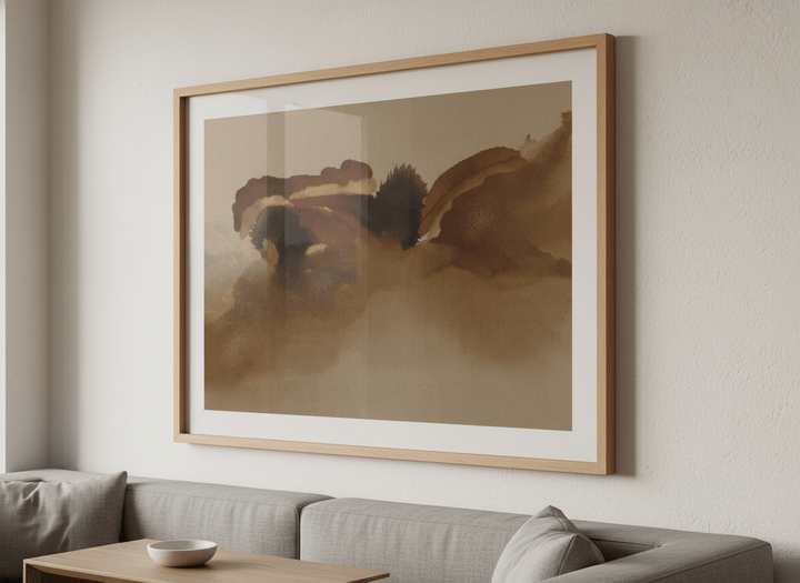 Modern wall art styled above a sofa in a neutral living room