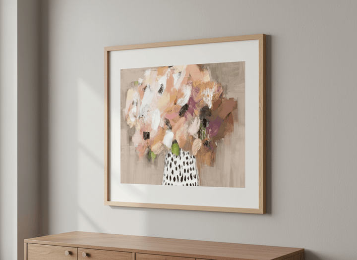 Minimalist artwork displayed in a calm, light-filled bedroom interior
