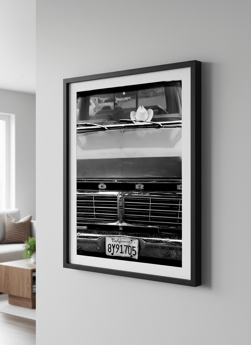Modern wall art styled above a sofa in a neutral living room