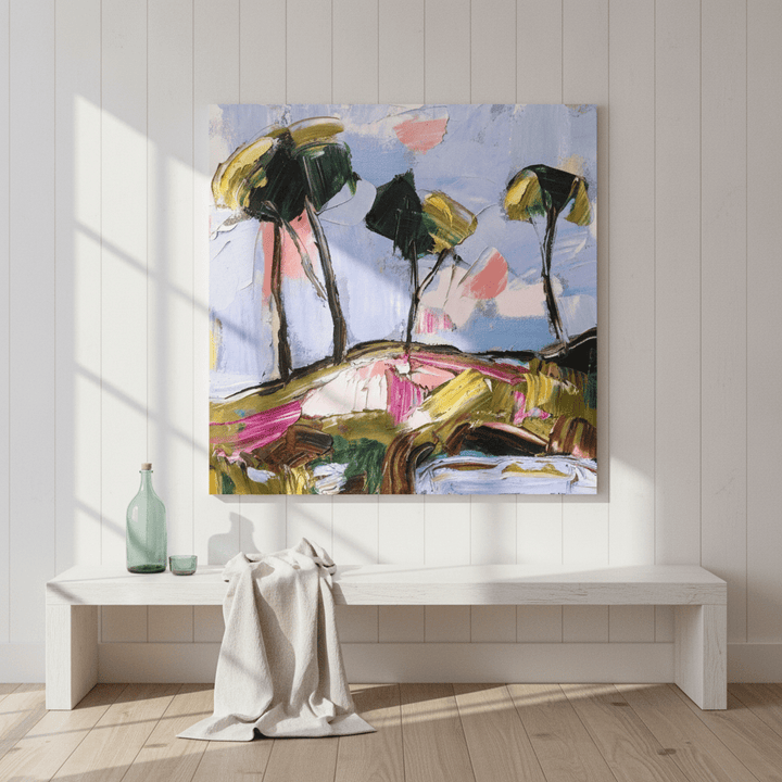Stretched canvas wall art styled on the wall in a coastal living room