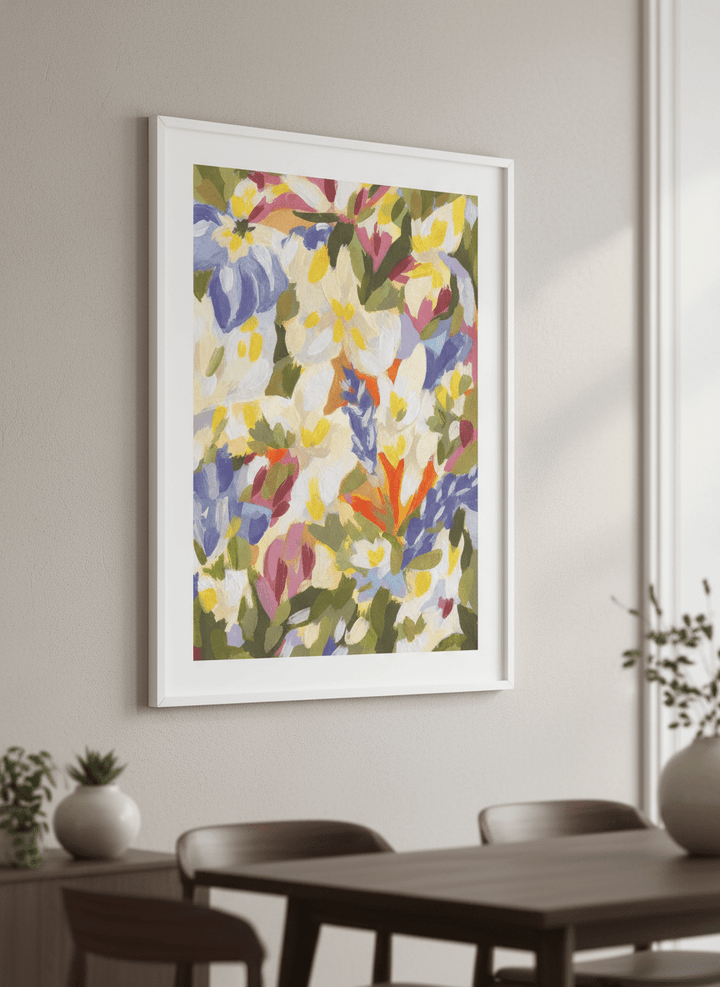 Wall art styled above a dining table in a contemporary home