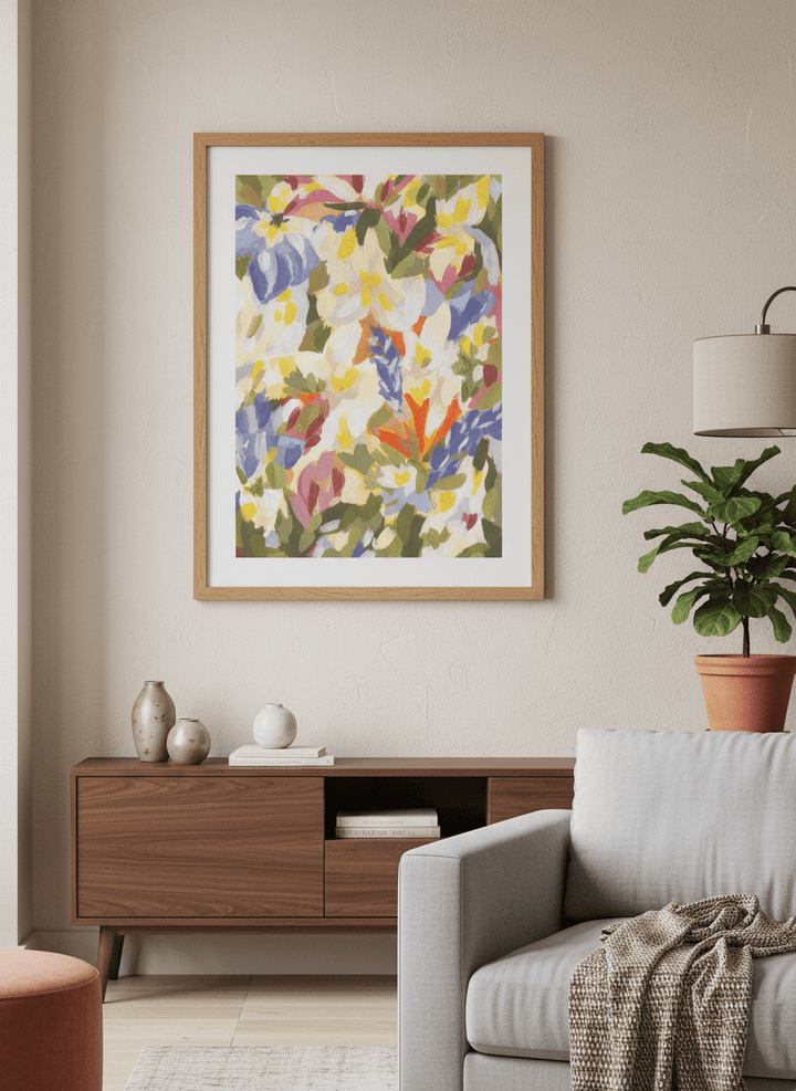 Modern wall art styled above a sofa in a neutral living room