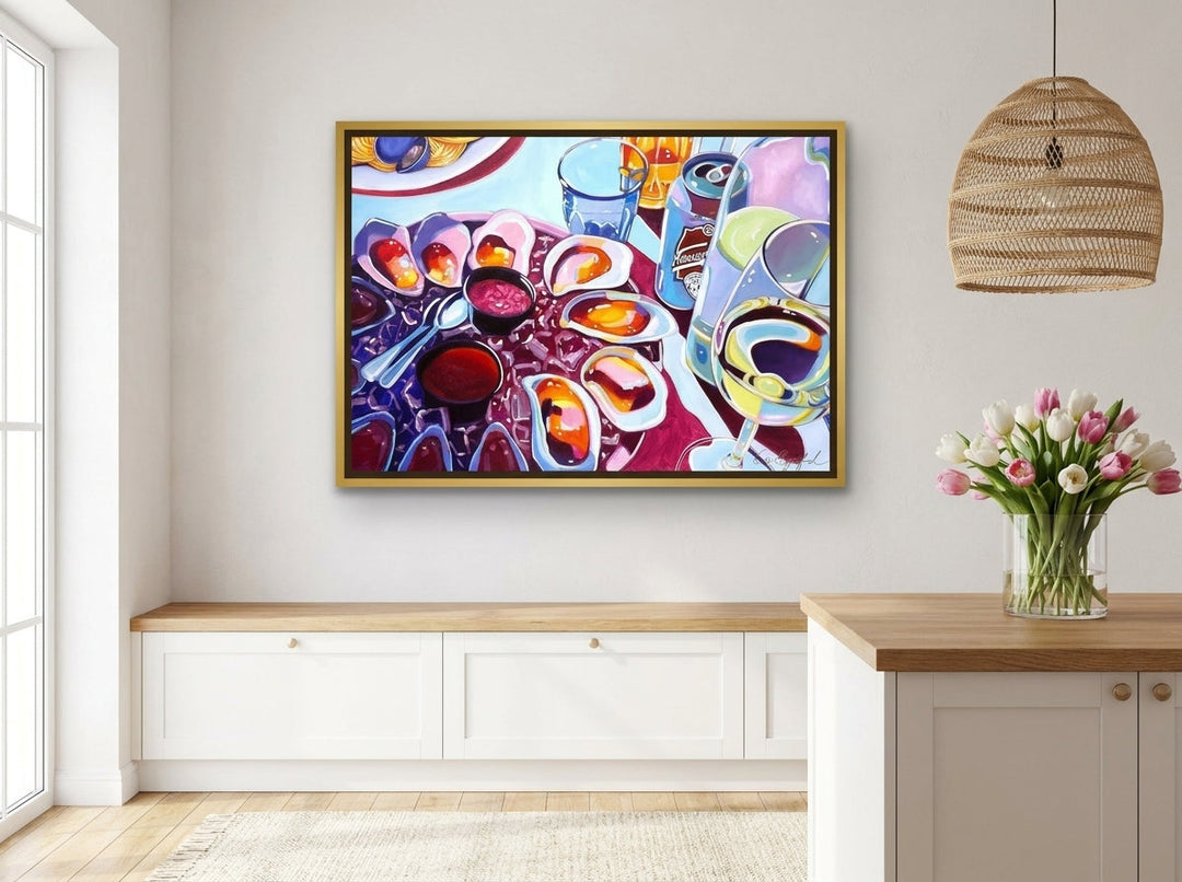 Canvas wall art with a gold leaf surround styled on the wall in a bright Scandinavian kitchen